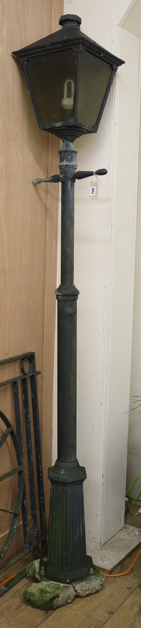 A metal electric lamp post W.32cm